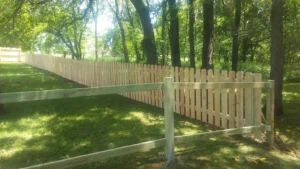 a wooden fence for the garden area