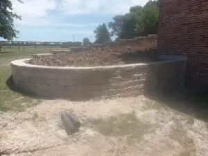 a round compound wall under construction