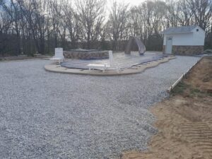 a swimming pool and patio work in progress